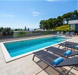 5 bedroom beachfront villa with heated pool near Omis, sleeps 9